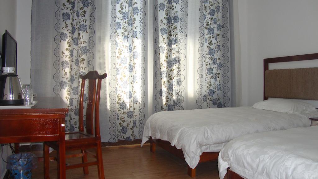 Faier Harbour Inn Dali  Camera foto